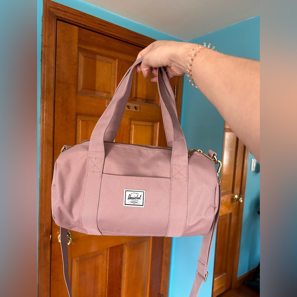 Herschel Supply Company - Pink Mini Duffle/Crossbody Bag. New without Tags.